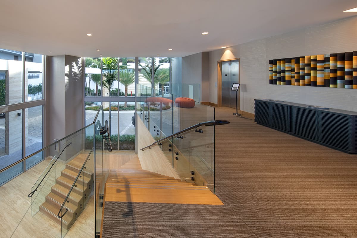 Lobby staircase and elevator entrance at The Harbour